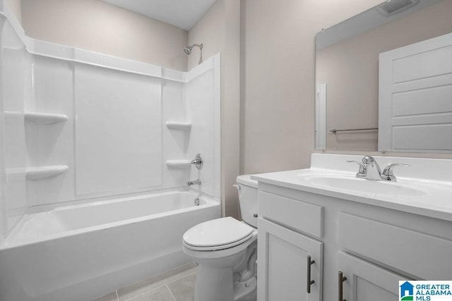 full bathroom with tile patterned floors, toilet,  shower combination, and vanity