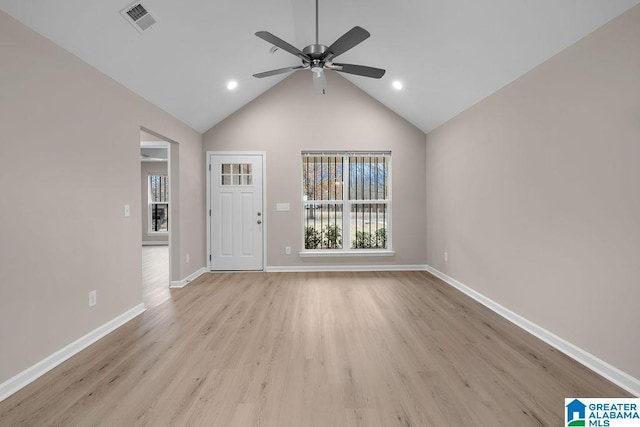 interior space featuring lofted ceiling, light hardwood / wood-style floors, and ceiling fan