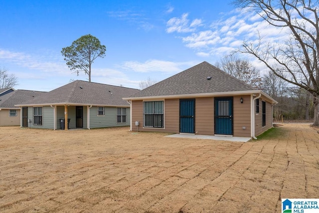 rear view of house with a patio area