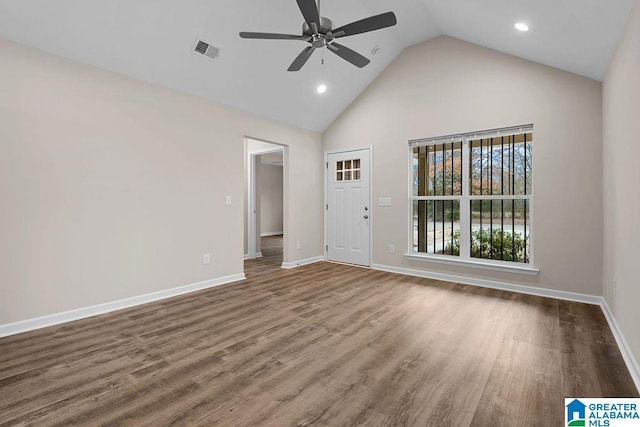 unfurnished room with wood-type flooring, ceiling fan, and high vaulted ceiling