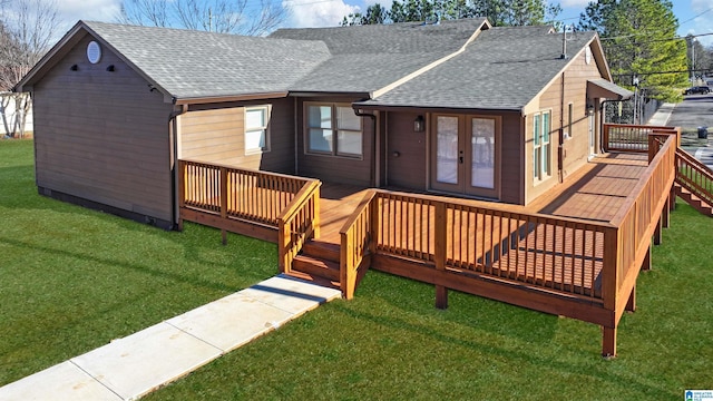 back of house with a yard, a deck, and french doors