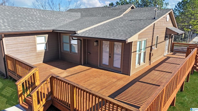 back of property with a wooden deck