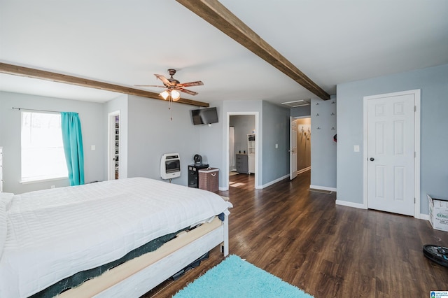 bedroom with beam ceiling, dark wood-type flooring, heating unit, and ceiling fan