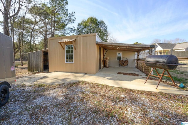 exterior space with a carport