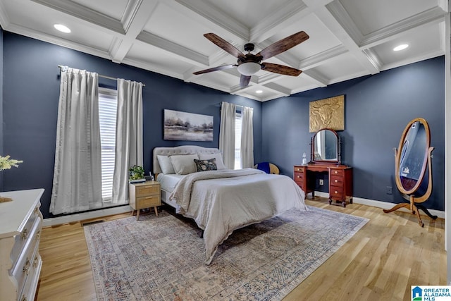 bedroom with multiple windows, coffered ceiling, ceiling fan, and light hardwood / wood-style floors