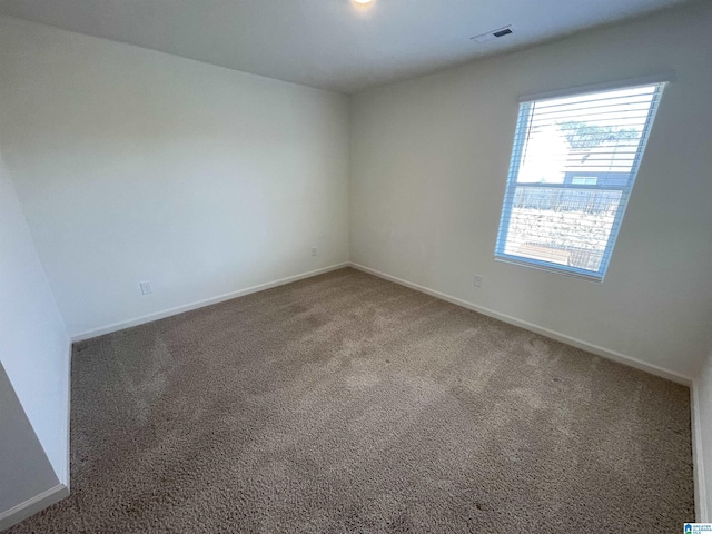 view of carpeted spare room