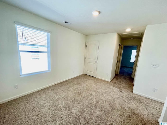 view of carpeted spare room