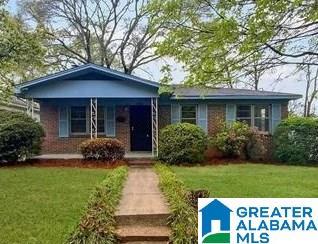 exterior space featuring a front yard