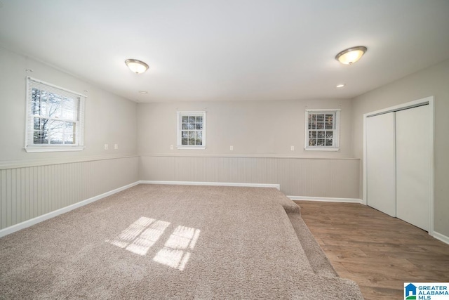 basement featuring hardwood / wood-style floors