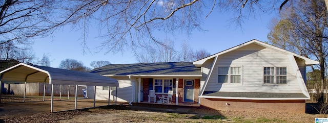 view of front of house featuring a carport and a porch