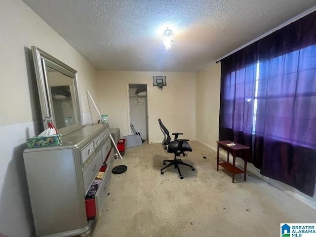 interior space featuring a textured ceiling