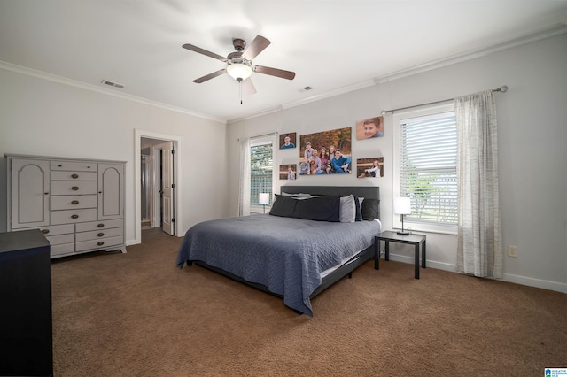 carpeted bedroom featuring ornamental molding and ceiling fan