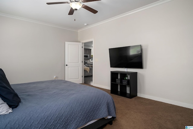 carpeted bedroom with crown molding and ceiling fan