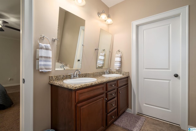 bathroom with vanity, tile patterned flooring, and ceiling fan