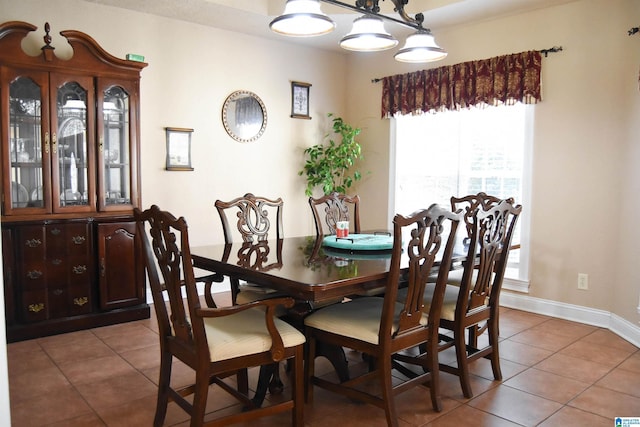 dining room with tile patterned floors