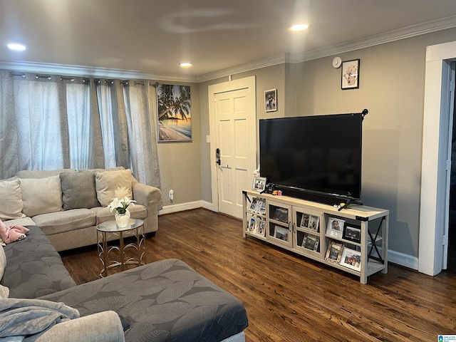 living room with crown molding and dark hardwood / wood-style flooring