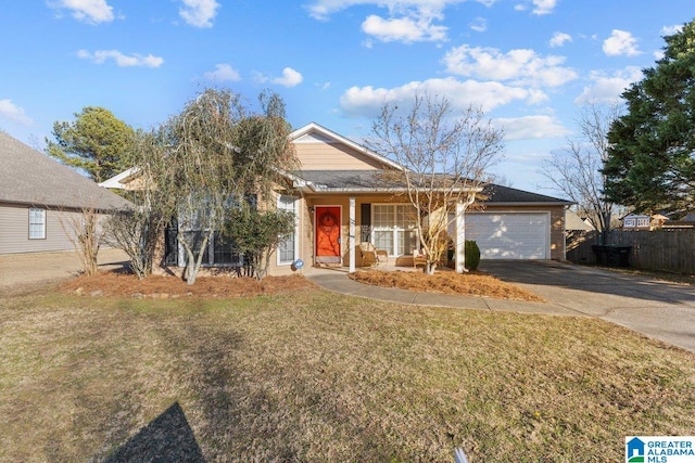 view of front of house with a garage, a front yard, and covered porch