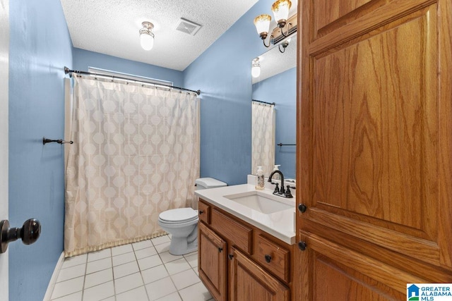 bathroom featuring vanity, toilet, tile patterned floors, a textured ceiling, and a shower with curtain