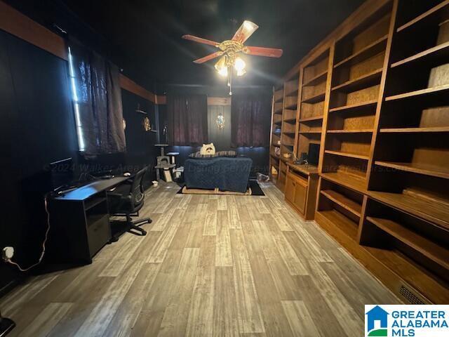 office space with ceiling fan and light wood-type flooring