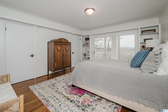 bedroom featuring dark hardwood / wood-style floors