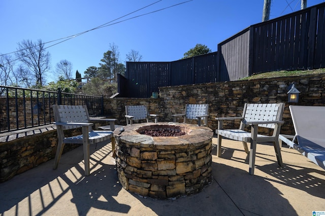 view of patio / terrace with a fire pit