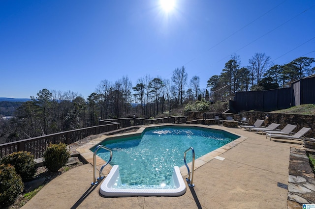 view of pool featuring a patio area