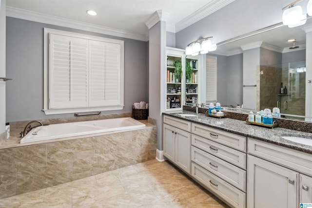 bathroom featuring plus walk in shower, ornamental molding, and vanity