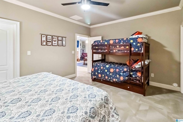 bedroom with crown molding, carpet floors, and ceiling fan