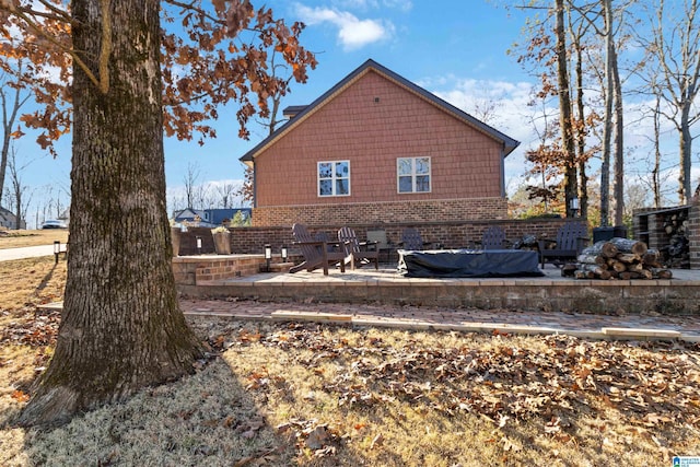 view of home's exterior with a patio area