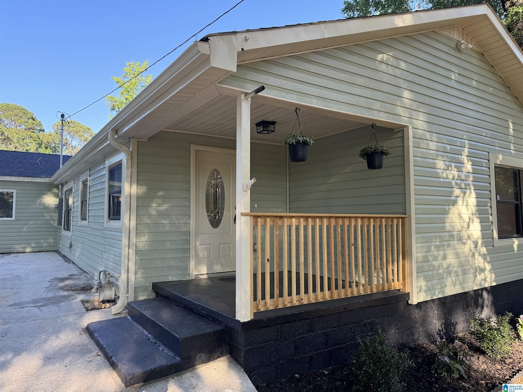 property entrance with a porch