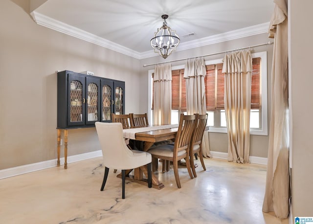 dining space featuring crown molding and a chandelier