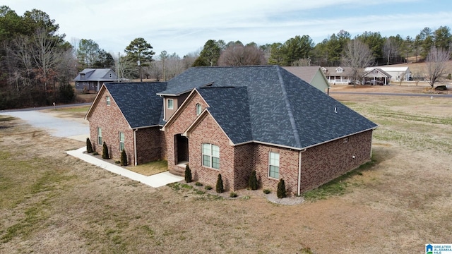 view of home's exterior featuring a yard