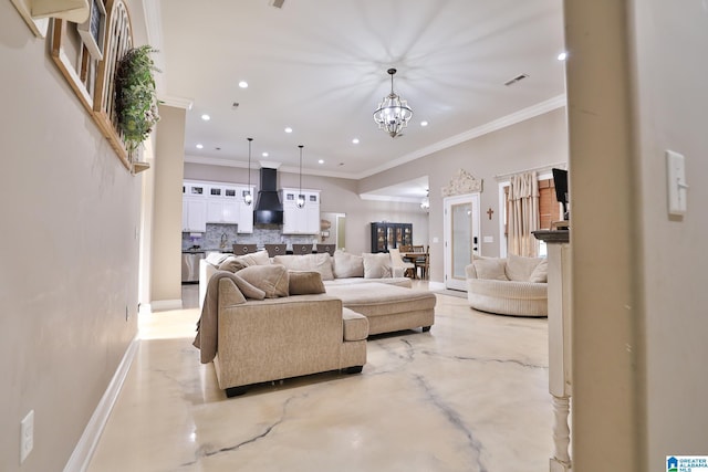 living room with crown molding and an inviting chandelier