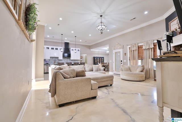 living room with an inviting chandelier and ornamental molding