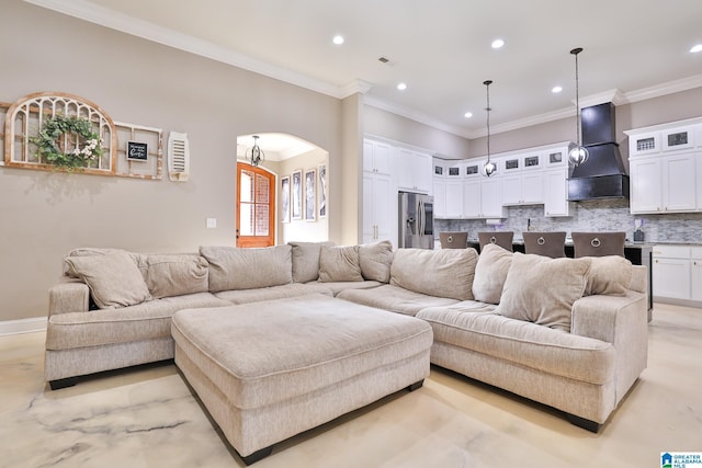 living room featuring crown molding