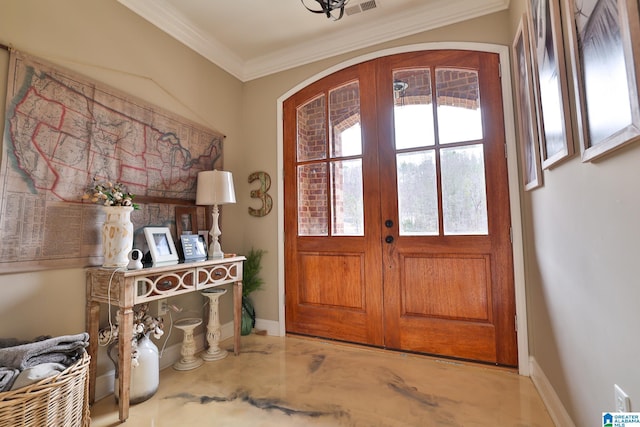 entrance foyer with french doors and ornamental molding