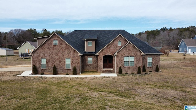 view of front of house with a front lawn