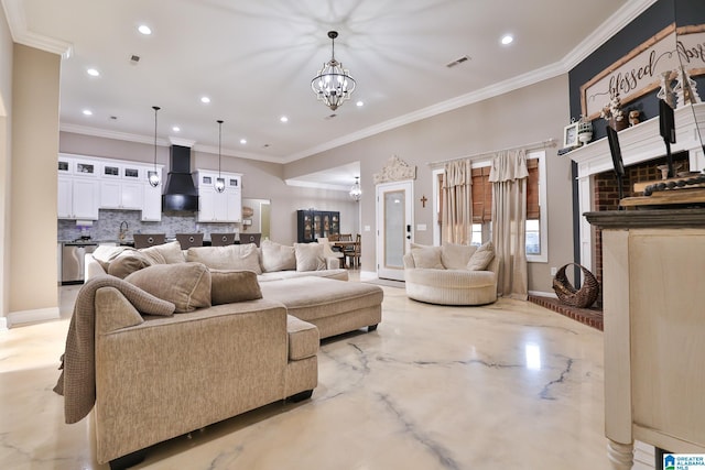 living room with a notable chandelier, crown molding, and sink