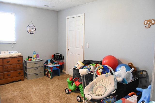 playroom with light colored carpet