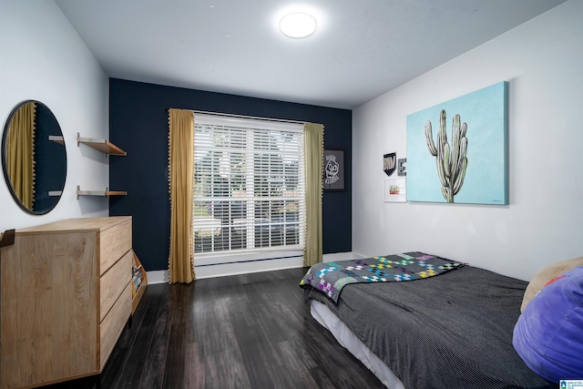 bedroom featuring dark wood-type flooring