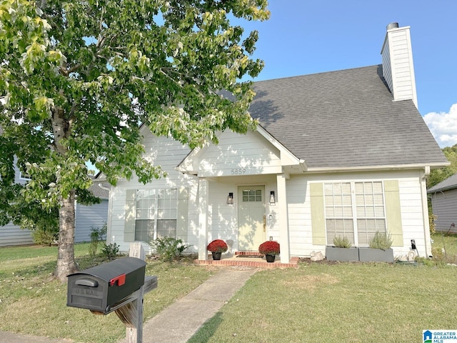 view of front of property with a front lawn