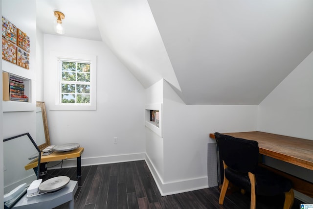 office with lofted ceiling and dark hardwood / wood-style floors