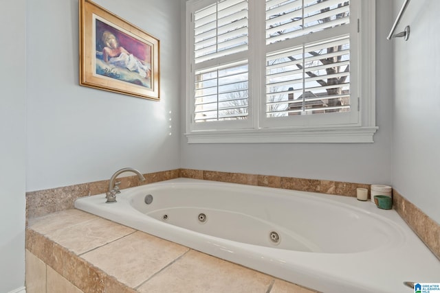 bathroom featuring tiled tub