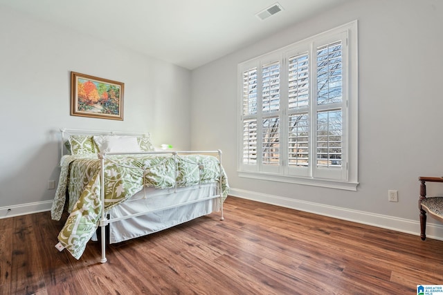 bedroom featuring wood-type flooring