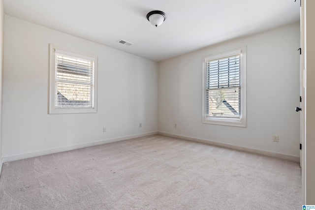 view of carpeted spare room