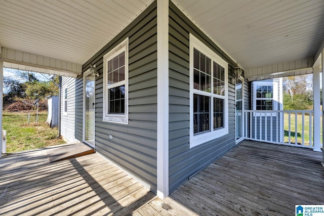 wooden terrace featuring a porch