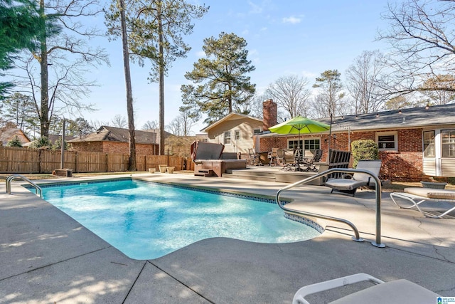 view of pool with a patio