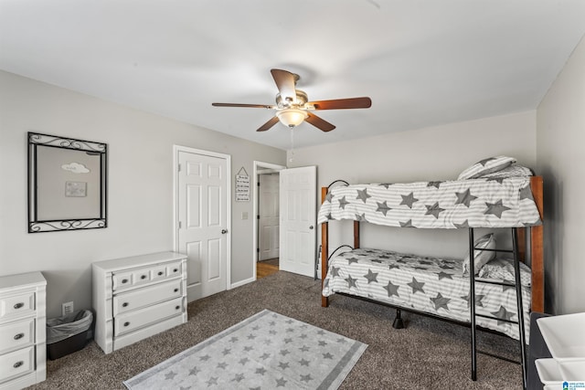 bedroom with dark carpet and ceiling fan