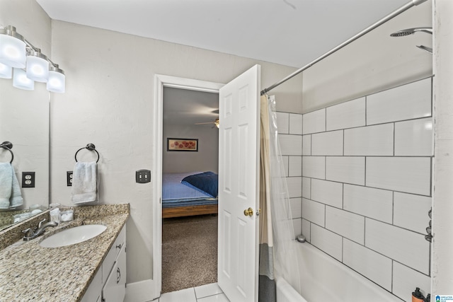 bathroom featuring vanity, shower / tub combo, and tile patterned floors