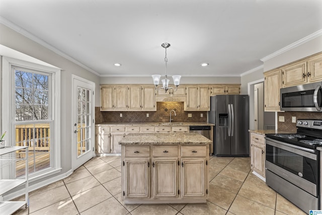 kitchen with sink, ornamental molding, a kitchen island, stainless steel appliances, and decorative backsplash